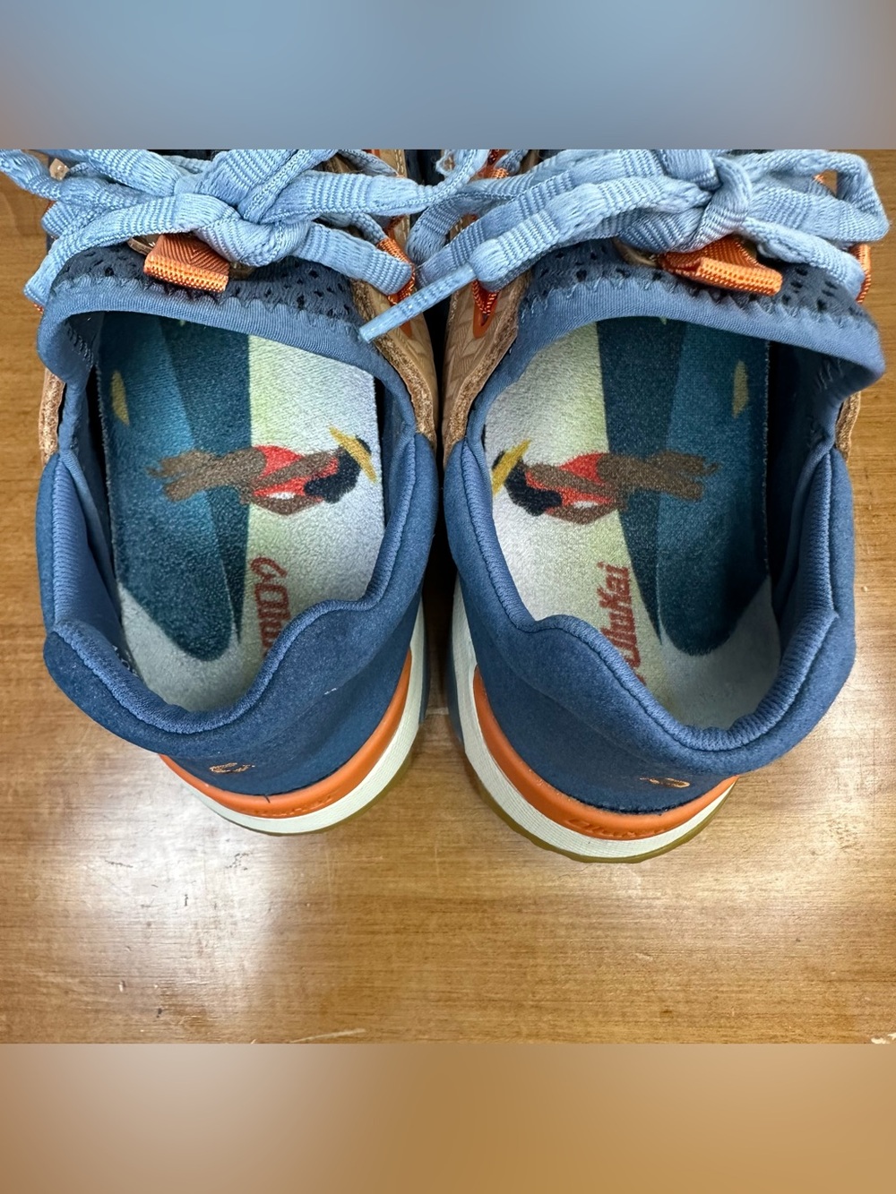 OluKai Women's Navy Blue and Tan Athletic Sneakers with Orange Accents - Picture 9 of 14